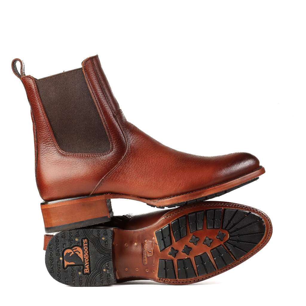 Vista lateral completa mostrando el elástico y la altura del botín.